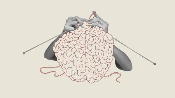 Hands knitting a brain - illustration SEO